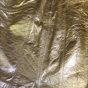 Two jackets and gold leather skirt